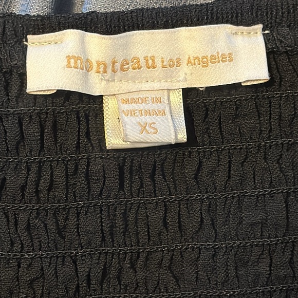 Sleeveless jumpsuit - Picture 3 of 4